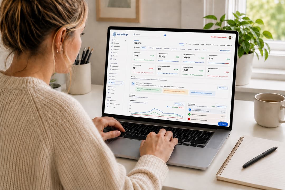 Claims analyst reviewing InsureHop on a laptop